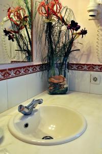 A bathroom at Petit Hotel Es Figueral