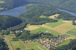 an aerial view of a village and a river at Ferienhaus Asel in Vöhl