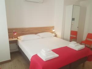 Postel nebo postele na pokoji v ubytování Parfumerie 5 Terre