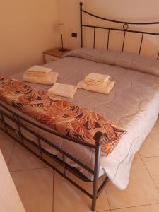 Cama o camas de una habitación en Caravaggio Apartments