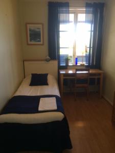 Voodi või voodid majutusasutuse Hotell Paradis toas