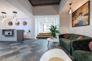 Posezení v ubytování UpperHouse Suites & More