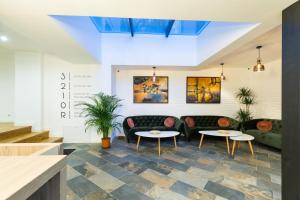 Posezení v ubytování UpperHouse Suites & More