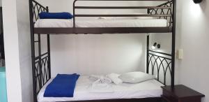 Postel nebo postele na pokoji v ubytování Sparta Team Hotel