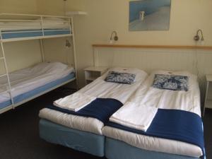 Voodi või voodid majutusasutuse Hotell Paradis toas
