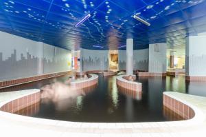 Bazén v ubytování Hunguest Hotel Aqua Sol nebo v jeho okolí