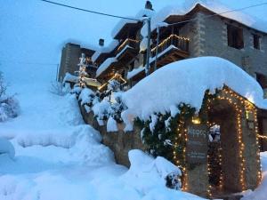 Nymfes Guesthouse v zime