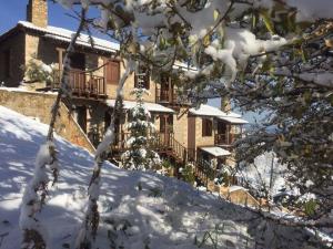 Nymfes Guesthouse v zime