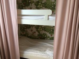 Voodi või voodid majutusasutuse Hotell Paradis toas