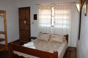 Postel nebo postele na pokoji v ubytování Encanto Rural