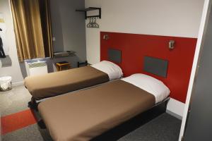 Postel nebo postele na pokoji v ubytování Fasthotel Bordeaux Eysines
