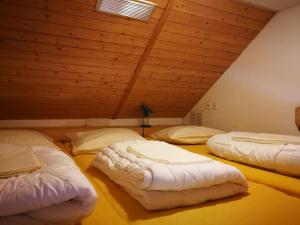 Letto o letti in una camera di juhui Flumserberg
