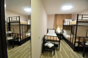 Letto o letti in una camera di Light Hotel