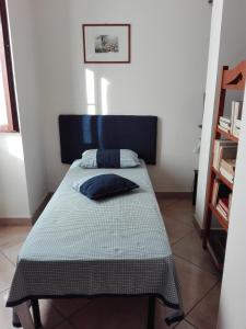 Posteľ alebo postele v izbe v ubytovaní Casa Conte
