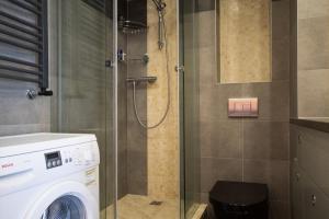 Koupelna v ubytování Metro Kabaty Studio + 32 fotografií