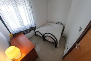 A bed or beds in a room at ARIES Case Vacanza