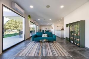 Posezení v ubytování Hotel A Curuxa Wellness