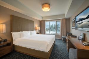 The Malcolm Hotel客房内的一张或多张床位
