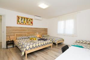 Krevet ili kreveti u jedinici u objektu B&B Borgo Antico