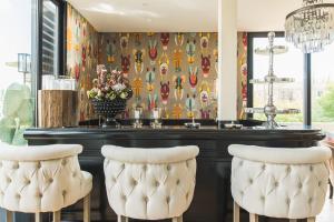 Vmaison Hotel Messina的休息区