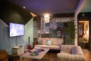 a living room with a couch and a table at Destino26 Hostel in Montevideo