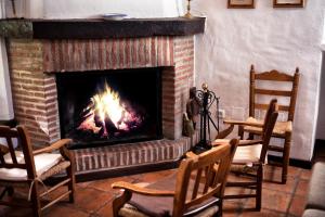 A seating area at Casa Rural La Maquinilla