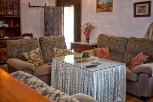 A seating area at Casa Rural La Maquinilla