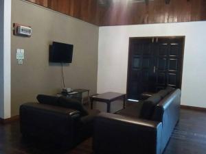 TV a/nebo společenská místnost v ubytování J Residence