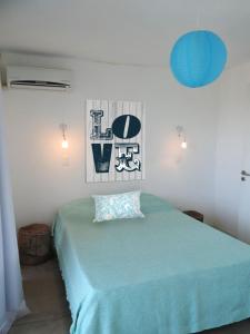 Letto o letti in una camera di Ammunaini