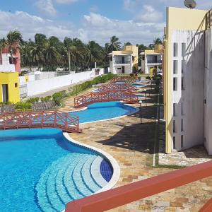 Swimmingpoolen hos eller tæt på Paraiso de Maracajau 1