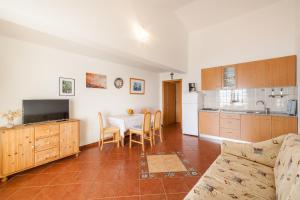 Kuchyň nebo kuchyňský kout v ubytování Ferienhaus Rajka