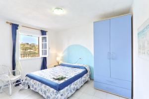 A bed or beds in a room at Rosa dei Venti
