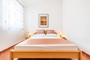 Postel nebo postele na pokoji v ubytování Ferienhaus Rajka