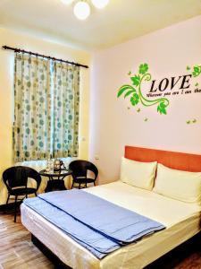 Voodi või voodid majutusasutuse 池上投優榻 Smart living B&B toas