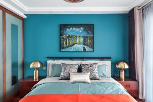 Ein Bett oder Betten in einem Zimmer der Unterkunft NanJing GuLou·Lion Bridge· Locals Apartment 00152470