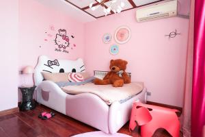 Ein Bett oder Betten in einem Zimmer der Unterkunft NanJing GuLou·Lion Bridge· Locals Apartment 00152470