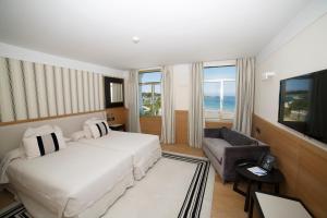 Телевизор и/или развлекательный центр в Gran Hotel Sardinero
