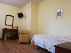 A bed or beds in a room at Labella María