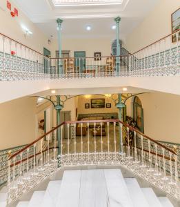 Postel nebo postele na pokoji v ubytování Hotel La Española