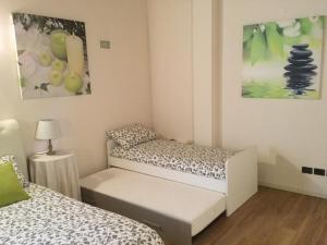 Postel nebo postele na pokoji v ubytování B&B CORTE SANT'ANGELO