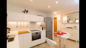 Kuchyňa alebo kuchynka v ubytovaní Apartamento Vera Canteras