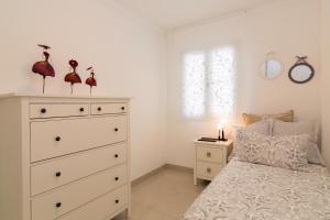 Posteľ alebo postele v izbe v ubytovaní Apartamento Vera Canteras
