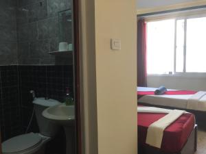 Koupelna v ubytování Nobel Hotel