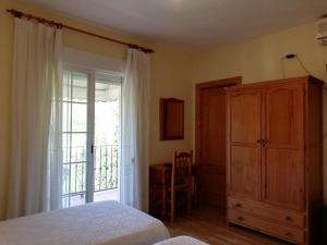 A bed or beds in a room at Labella María