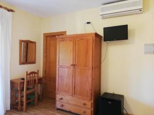 A television and/or entertainment centre at Labella María