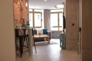 Posedenie v ubytovaní Piso con piscina y garaje en la Playa de Las Canteras