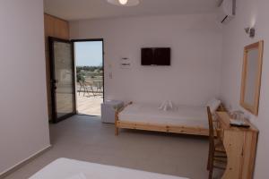 Imagem da galeria de Paradise Matala Hotel em Matala mais 34 fotografias