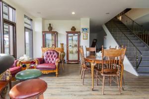Posezení v ubytování Tata House B&B