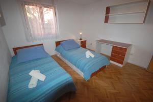 Posteľ alebo postele v izbe v ubytovaní Apartments Daidzic by El-Pi Tours