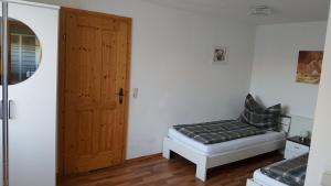 a room with a door and a bench in a room at ferienhausfindling St.Lambrecht in Sankt Lambrecht